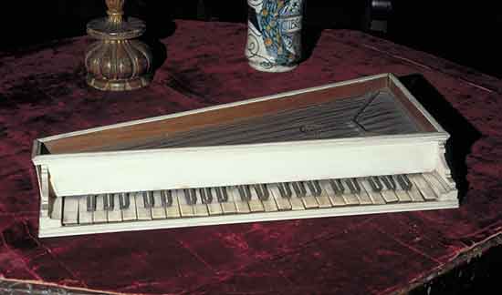 A trapezoidal virginal made in ivory